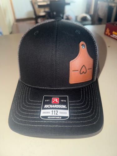 Customer photo review of Ear Tag Custom Leather Patch Trucker Hat - Richardson 112