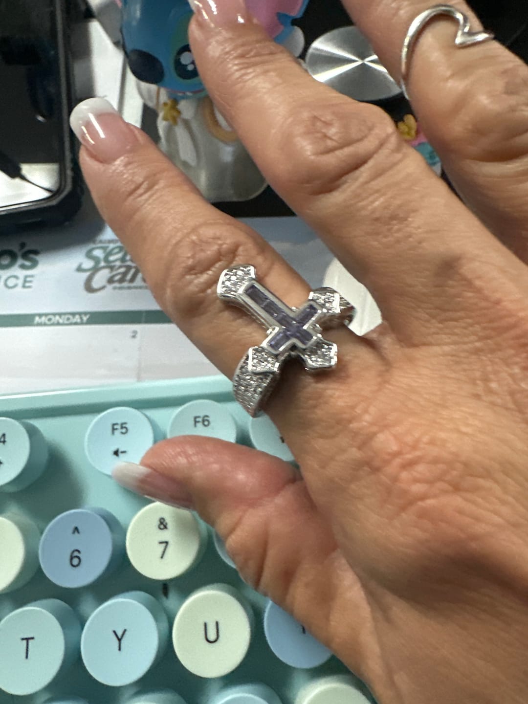 Customer photo review of Christianartworkshop Central Cross Motif Ring with Cubic Zirconia Accents: Carry His Care in Daily Wear