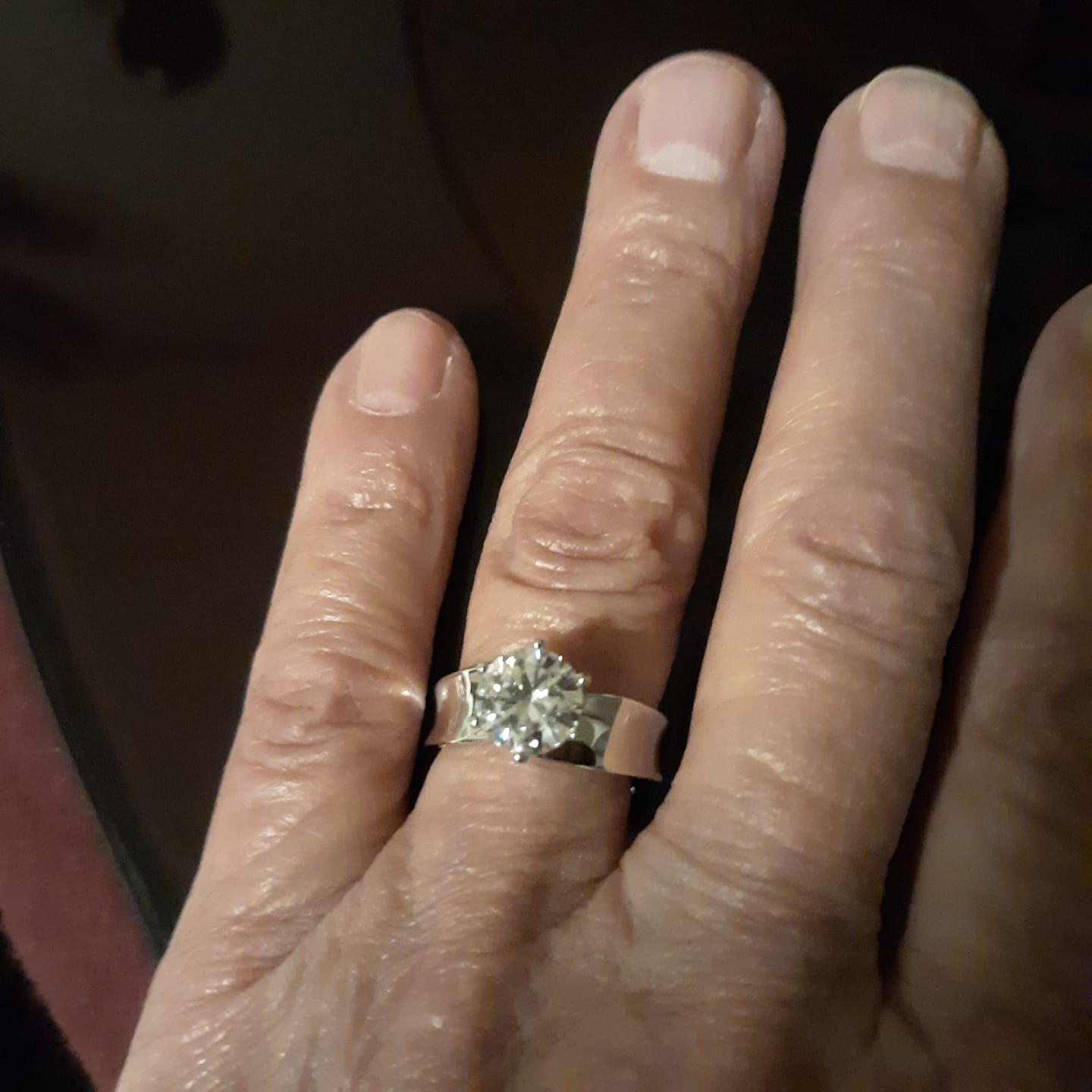 Customer photo review of Solitaire Round Moissanite Concave Wide Band Engagement Ring
