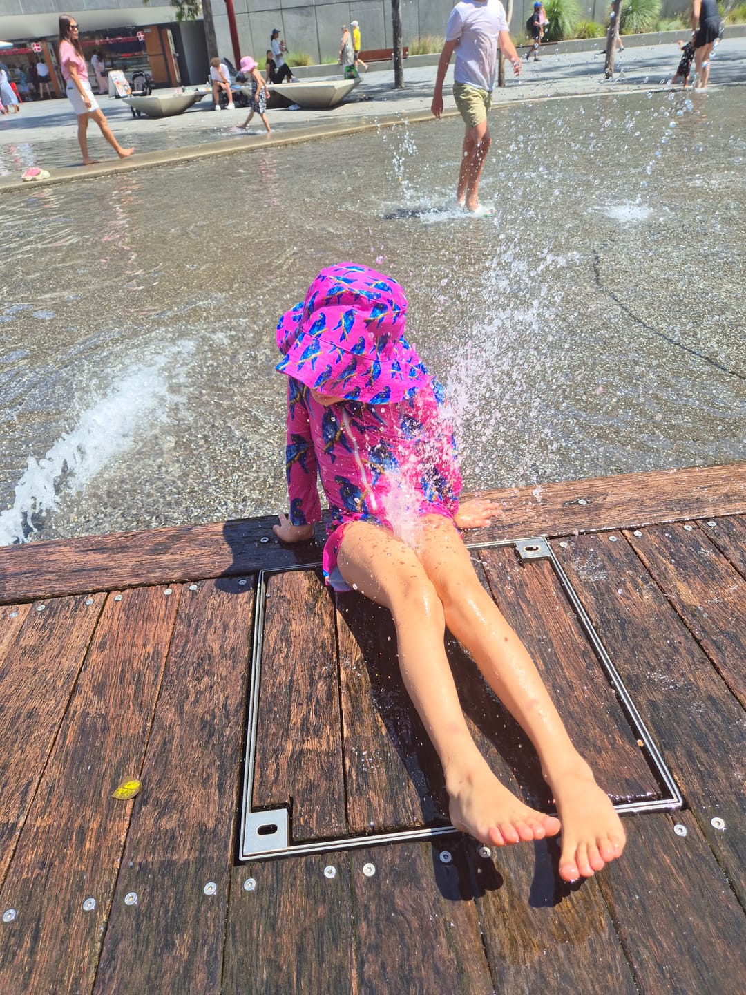 Customer photo review of PREORDER Fluro Macaw Girls Long Sleeve Zip Swimmers (Ships w/c 23rd Feb)