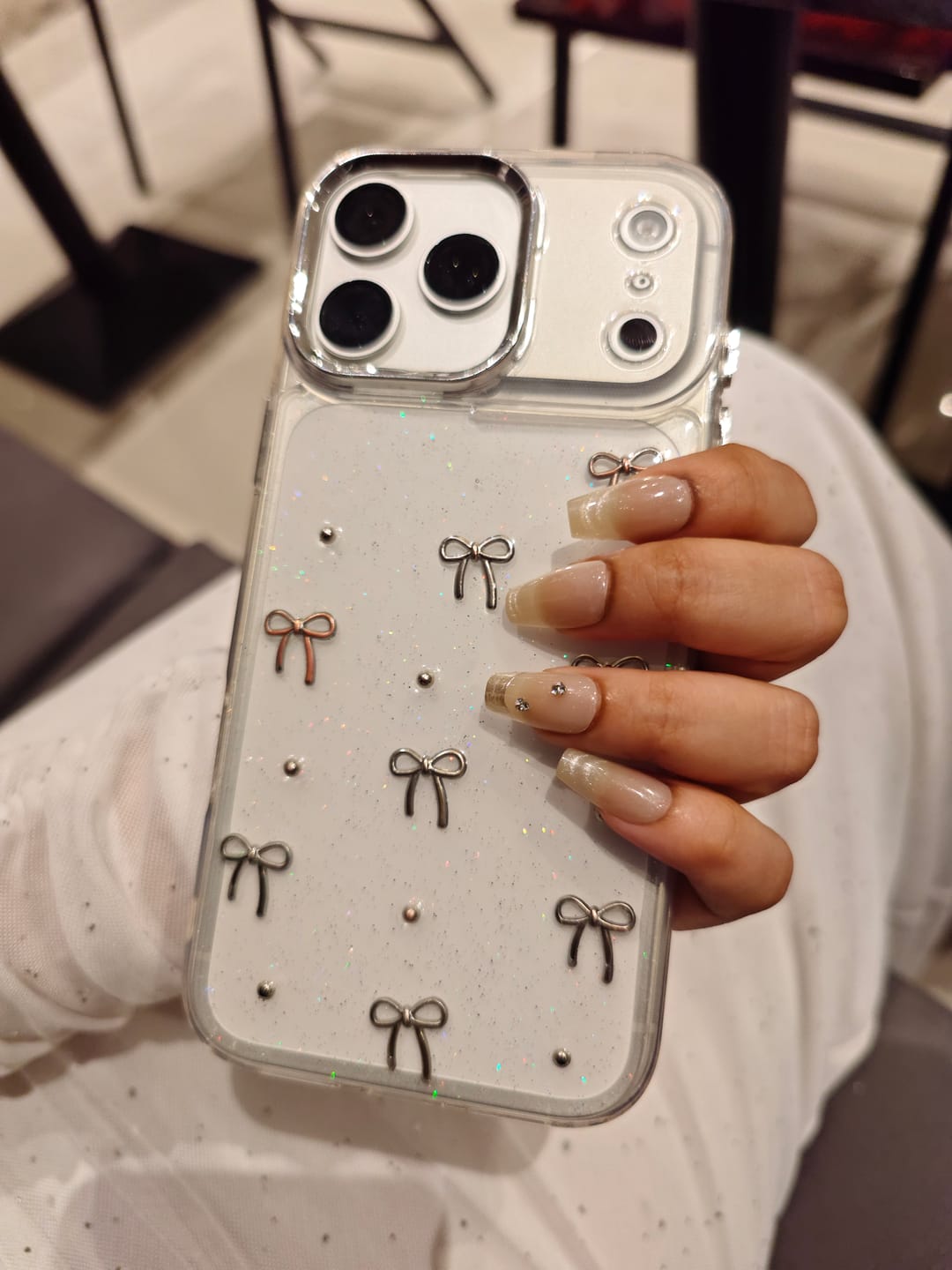 Customer photo review of 3D Glitter Silver Bow Transparent iPhone Case