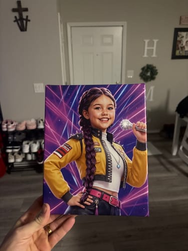 Customer holding their vibrant K-Pop Queen personalized canvas, showing a girl as a singer.