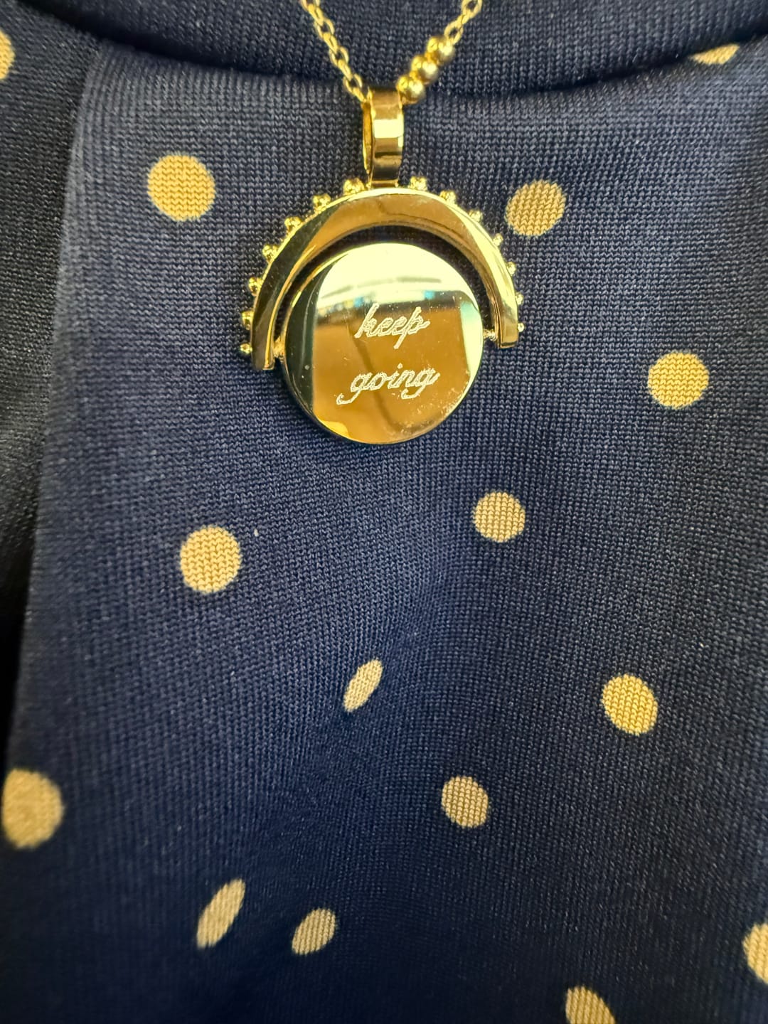 Customer photo review of Engravable Spinning Necklace