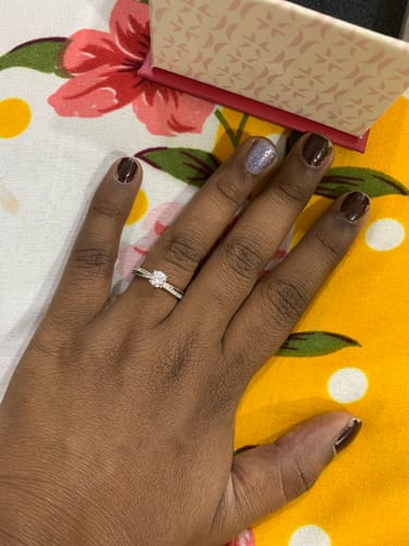 Customer wearing the Silver Zircon Layered Ring, showing the layered band and center stone.