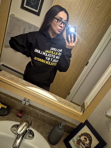 Customer photo review of Stolen Land Hoodie