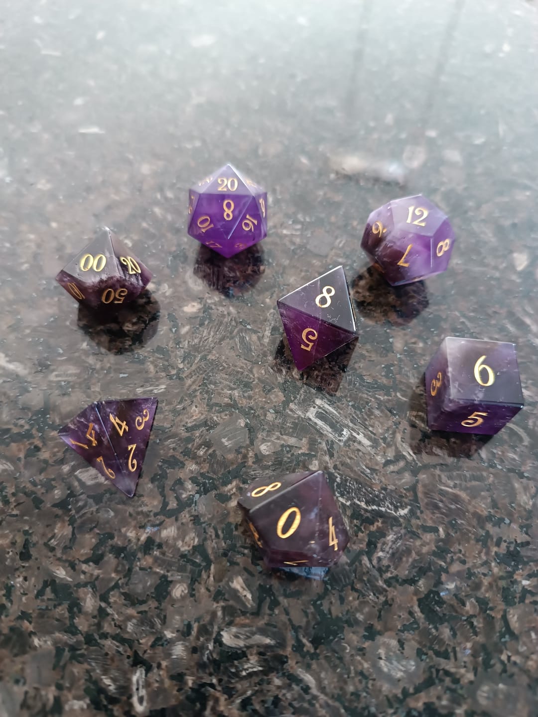 Customer photo review of URWizards D&D Amethyst Gemstone Engraved Dice Set
