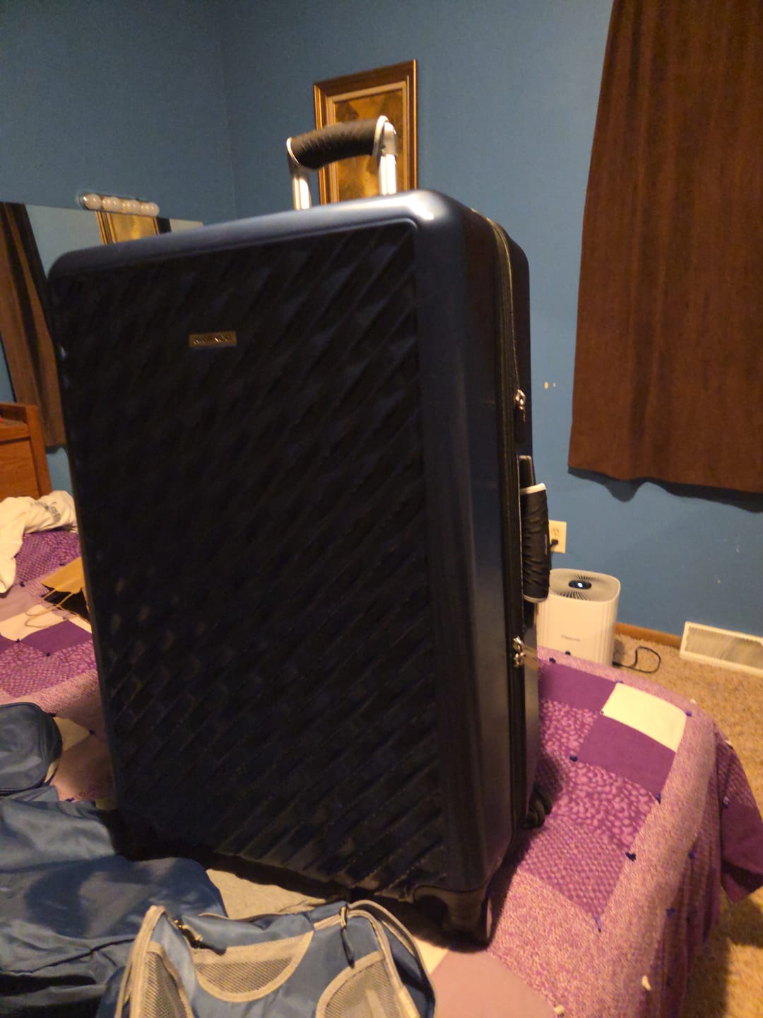 Customer photo review of Melrose Hardside Large Check-In Expandable Spinner