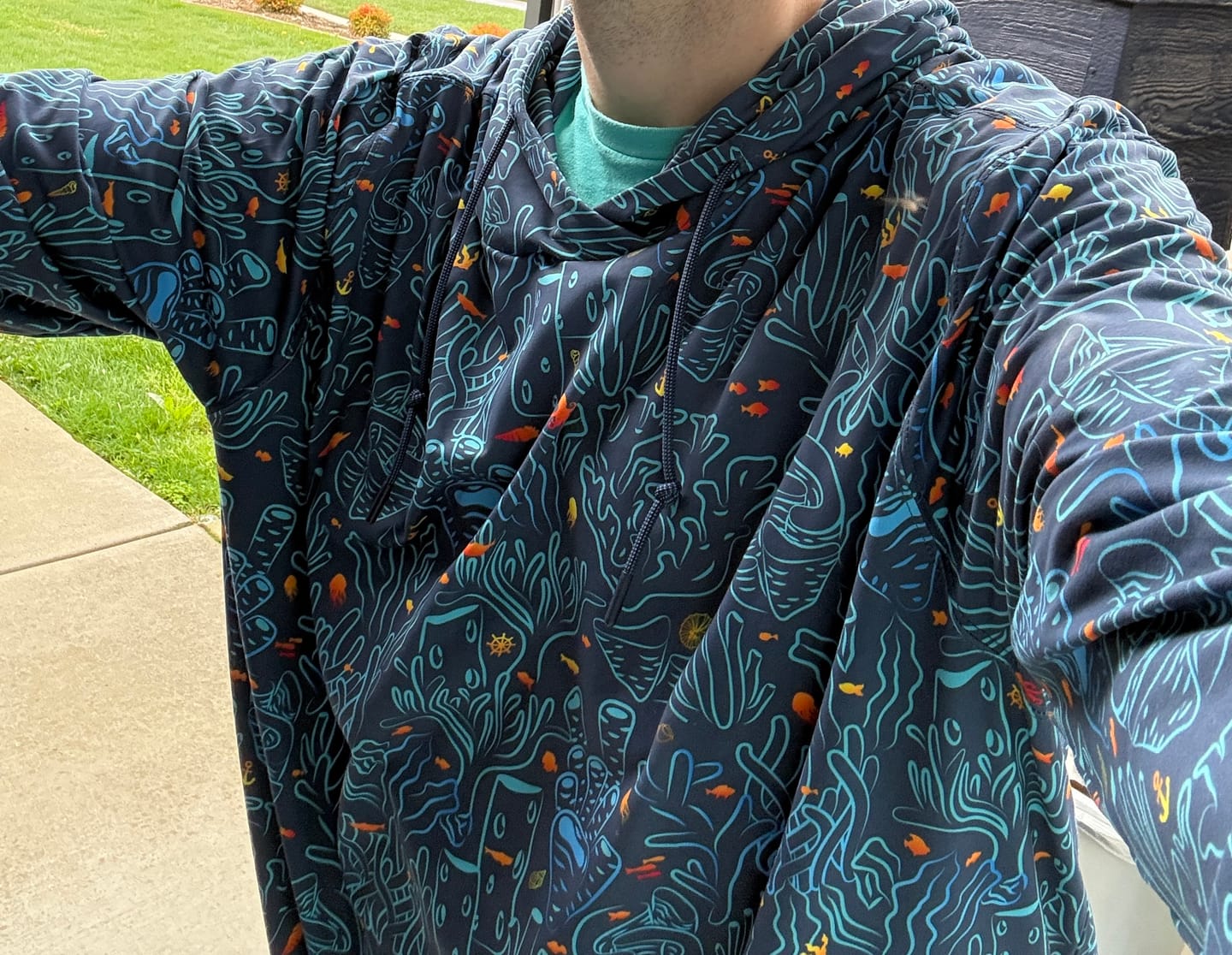 Customer photo review of Coral – Performance Hoodie