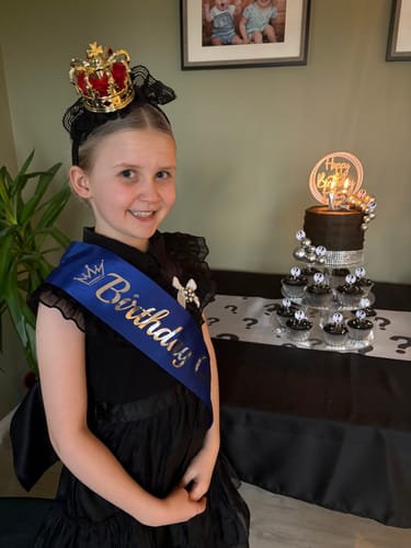 Reviewer's daughter celebrating her 12th birthday before playing the Mystery At The Museum game.