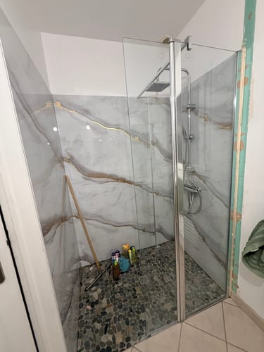 Customer photo review of Panneau Mural PVC Effet Marbre Doré – Étanche et facile à poser