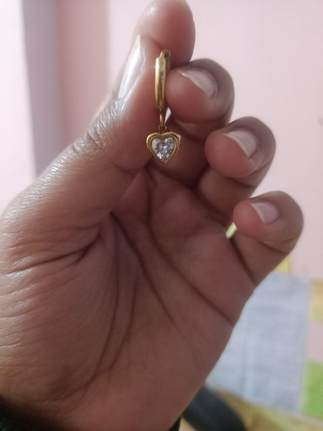 Customer photo review of Gemini Heart Hoops