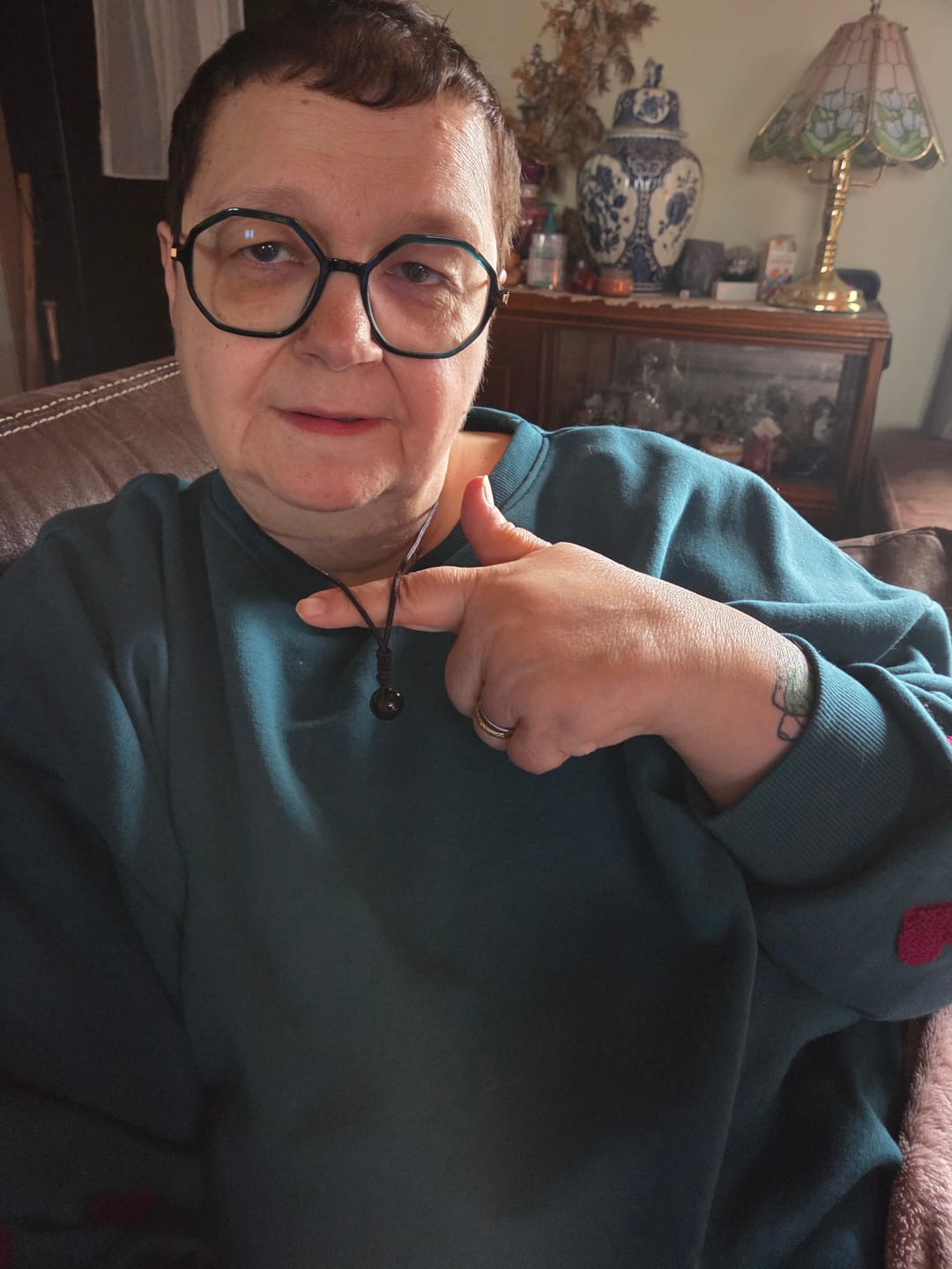 Customer photo review of Pendentif "Sphère" en Obsidienne Dorée