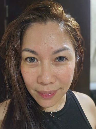 Close-up of a customer wearing the Innocent Smoke Grey contact lenses, showing off the soft grey color.