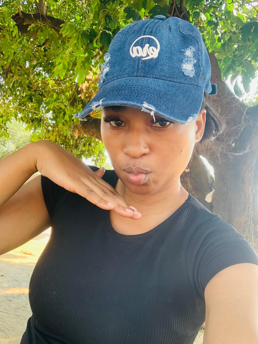 Customer photo review of Era Distressed Denim Cap