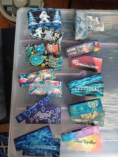 Reviewer's full Winter Wonderland Mega Mystery 10-Pack, showing all ten colorful wristbands, including the Yeti and wolf designs.