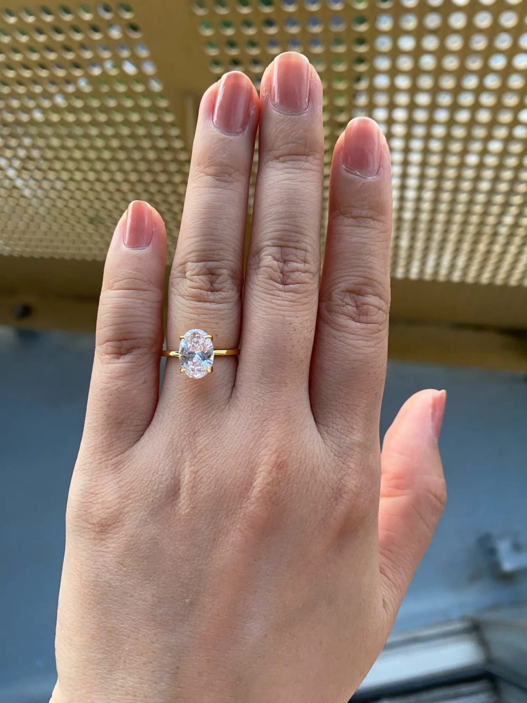 Customer photo review of Oval Hidden Halo Engagement Ring