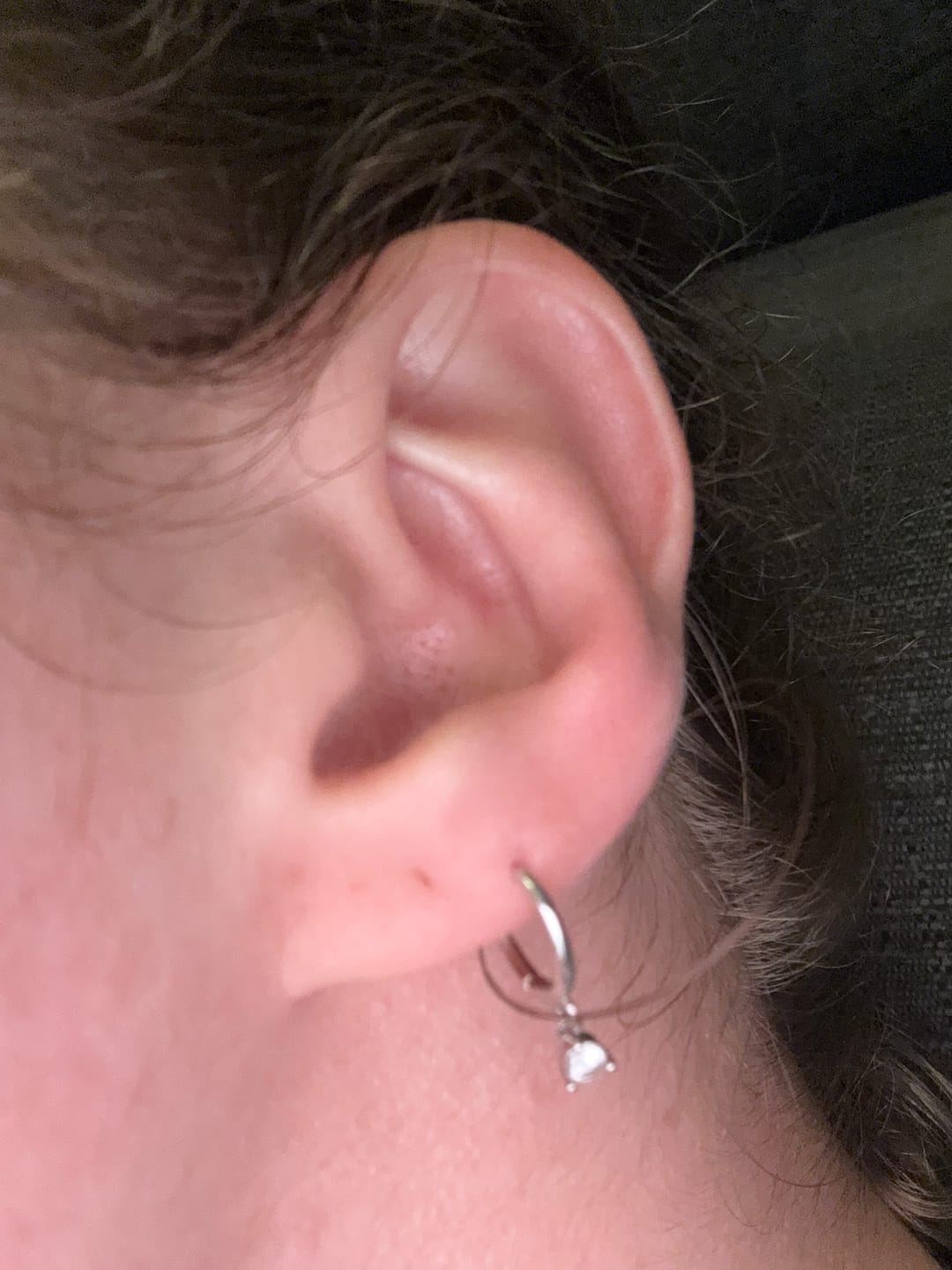 Customer photo review of Solitaire Hoop Huggie Earrings