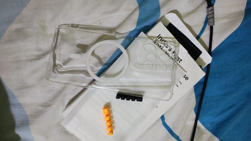 Customer's clear Anti-Yellow Magsafe case for the Motorola Edge 50 Pro lying on a patterned surface.