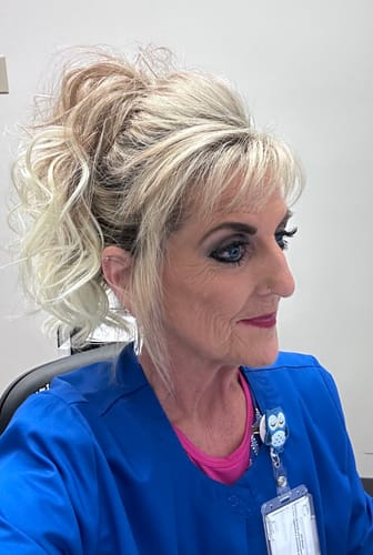 Reviewer wearing the JuvaBun Claw Clip Ponytail Extension in a voluminous, wavy updo.