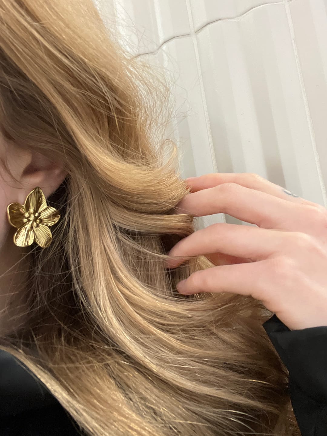 Customer photo review of Maebry - Statement Flower Stud Earrings Gold Stainless Steel