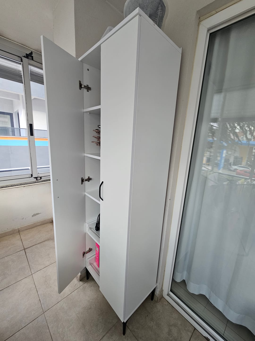 Customer photo review of Rani JE110 Çok Amaçlı Dolap 2 Kapaklı 5 Raflı Banyo Kiler Mutfak Dolabı Beyaz