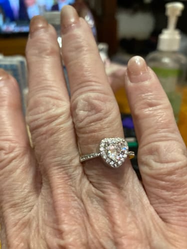 Reviewer's hand wearing the beautiful, heart-shaped Forever In My Heart Urn Ring.