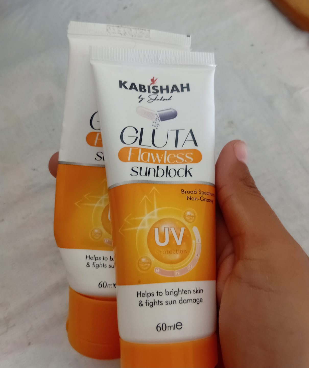 Customer photo review of Gluta Flawless Sunblock