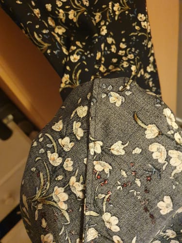 Close-up of a customer's neatly sewn seam on a garment made with the black floral viscose fabric.