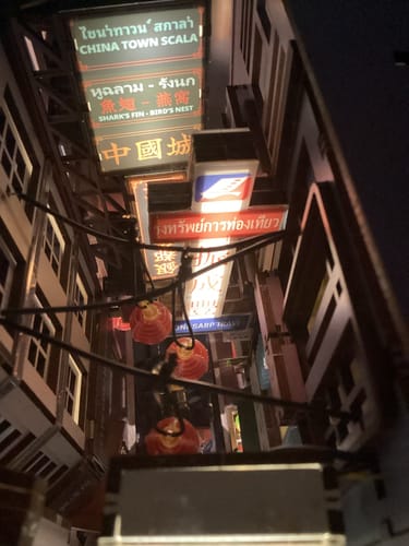 Close-up: Reviewer's top-down view of the Bangkok Yaowarat Book Nook Kit, showing glowing signs and intricate wires at night.