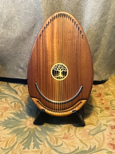 Customer photo review of BunnyNest A-Frame Guitar Stand – Collapsible, Lightweight, Portable, & Universal for Acoustic, Electric, and Bass Guitars