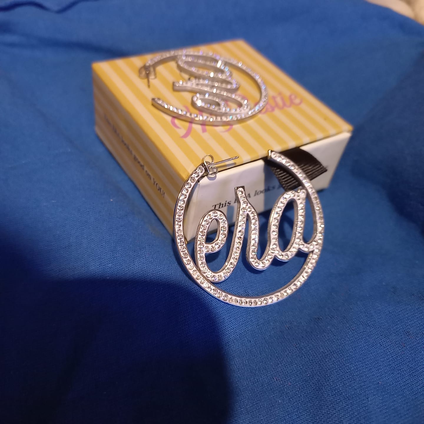 Customer photo review of Silver Luxe Logo Hoops