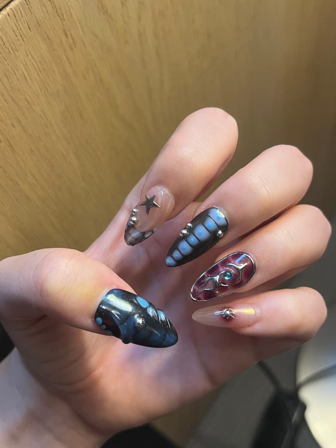 Customer photo review of Galaxy Whirlwind Press-On Nails – Iridescent Blue Purple Chrome Fake Nails Gothic Style