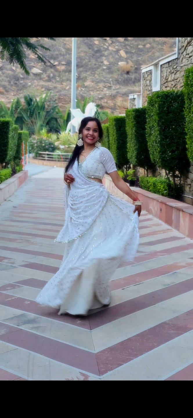 Customer photo review of Astoria Ivory Mirror Work Lehenga Set