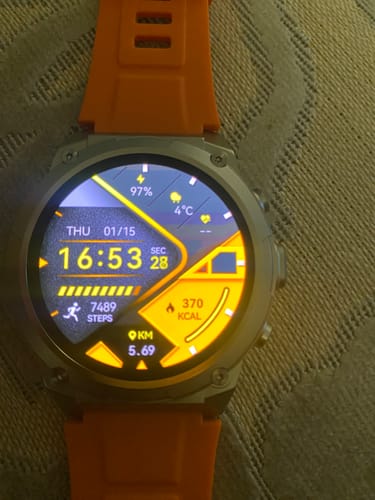 Customer's Gard Pro Ultra 3 with an orange band. The digital face displays activity stats like steps, calories, and distance.