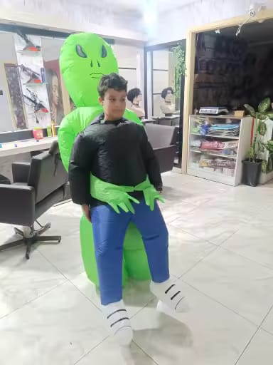 Customer photo review of Inflatable Alien Costume – Funny "Pick Me Up" Illusion Suit