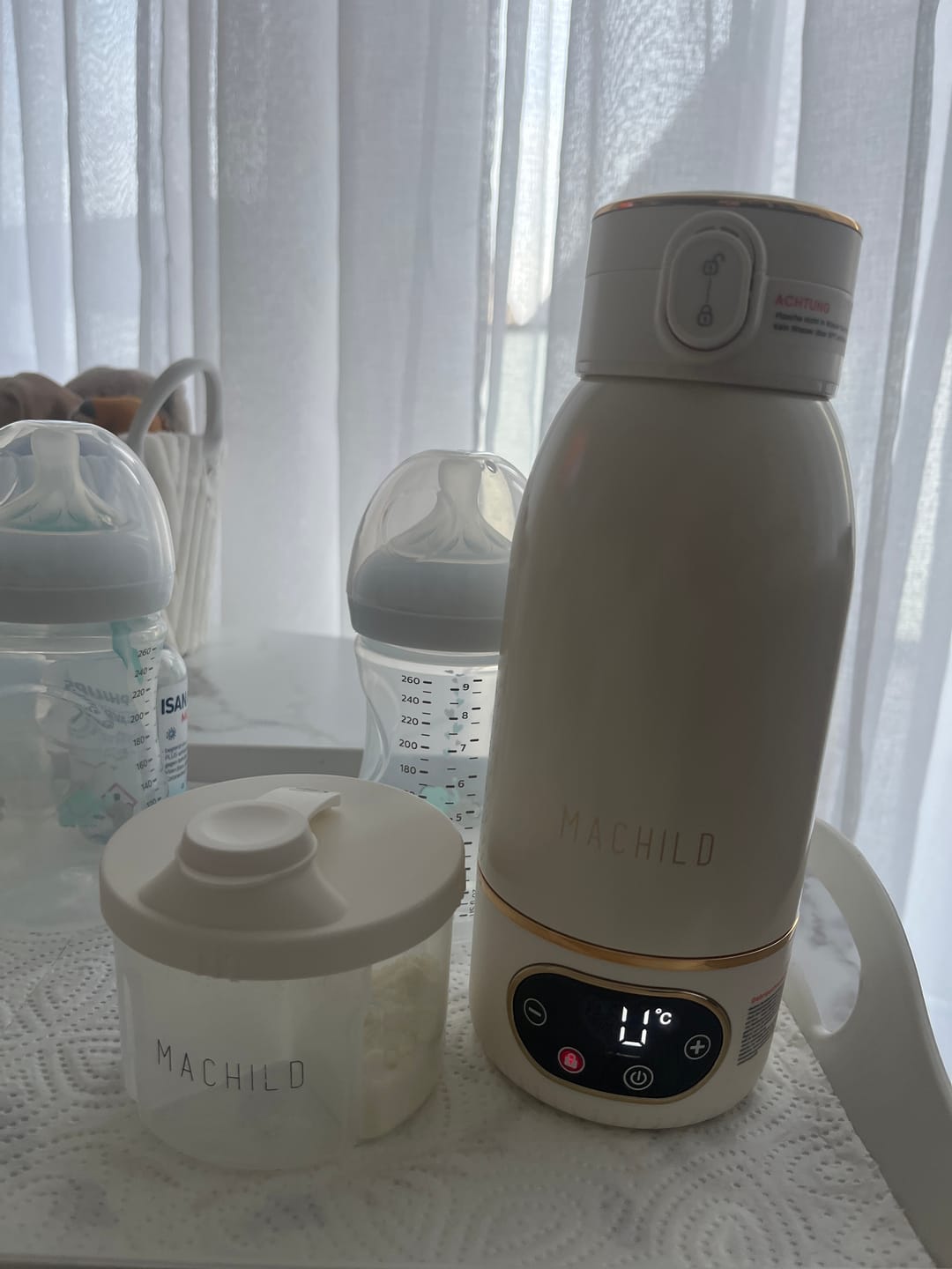 Customer photo review of Tragbarer Fläschchenwärmer + Milchpulverbox (weiß) + Schnell-Ladegerät