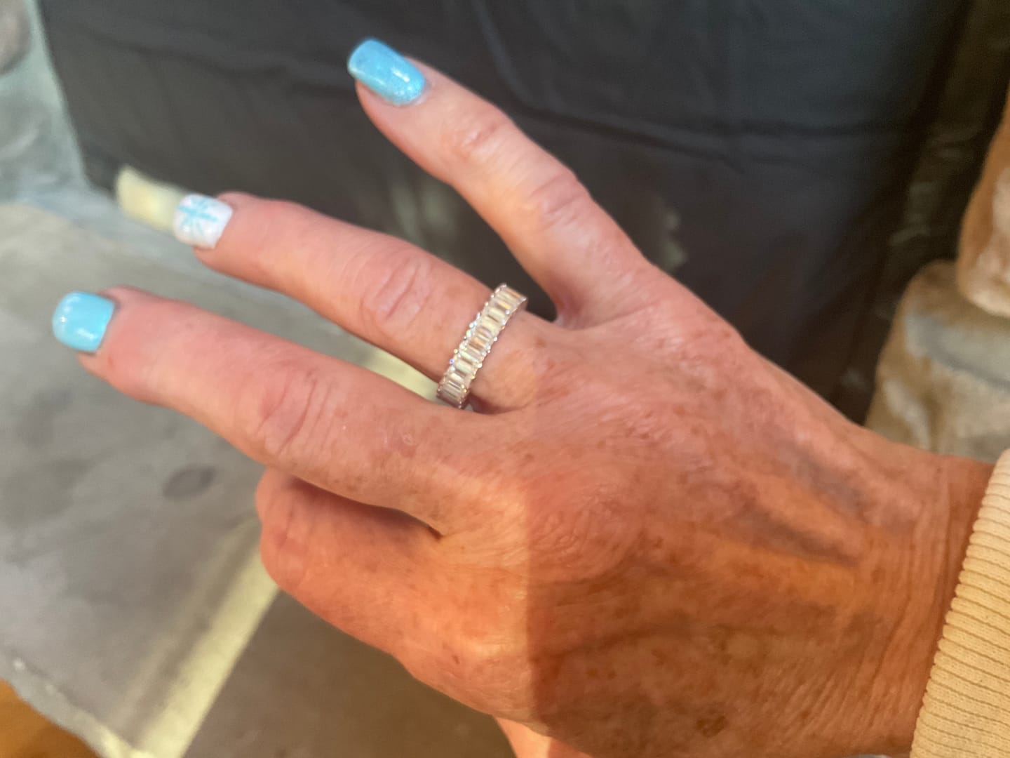 Customer photo review of 4ct Moissanite Emerald Cut Eternity Ring
