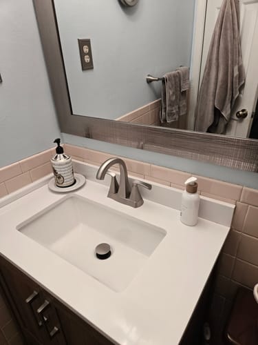 Customer's pristine bathroom sink and counter after using the Multi-Surface Concentrate.