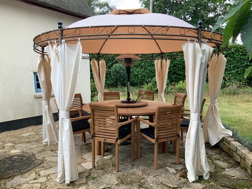 Customer photo review of 180cm Round Maximus Teak Table with 4cm Table Top: Timeless Outdoor Table