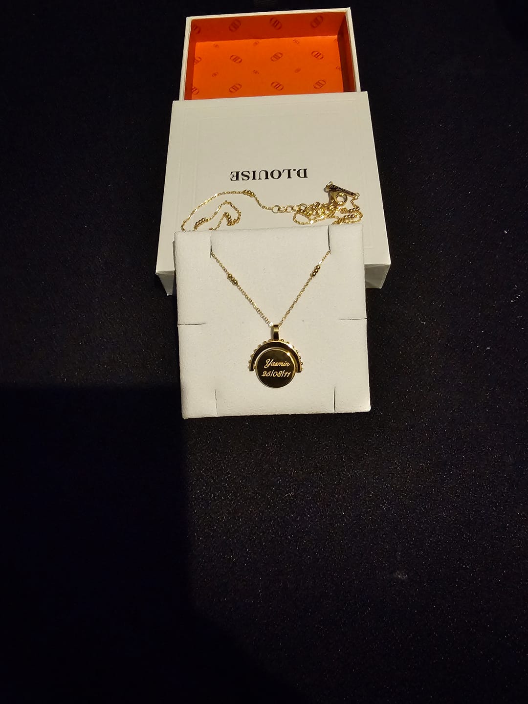 Customer photo review of Engravable Spinning Necklace