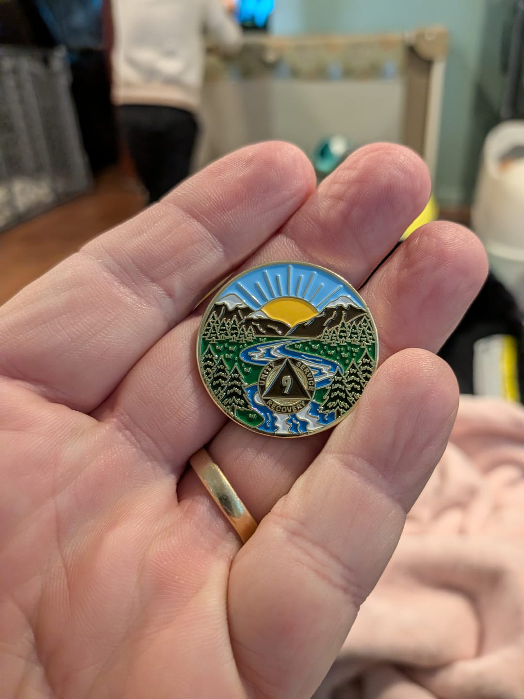 Customer photo review of 1 to 65 Year Sobriety Mint Winding River Gold Plated AA Recovery Medallion/Chip/Coin