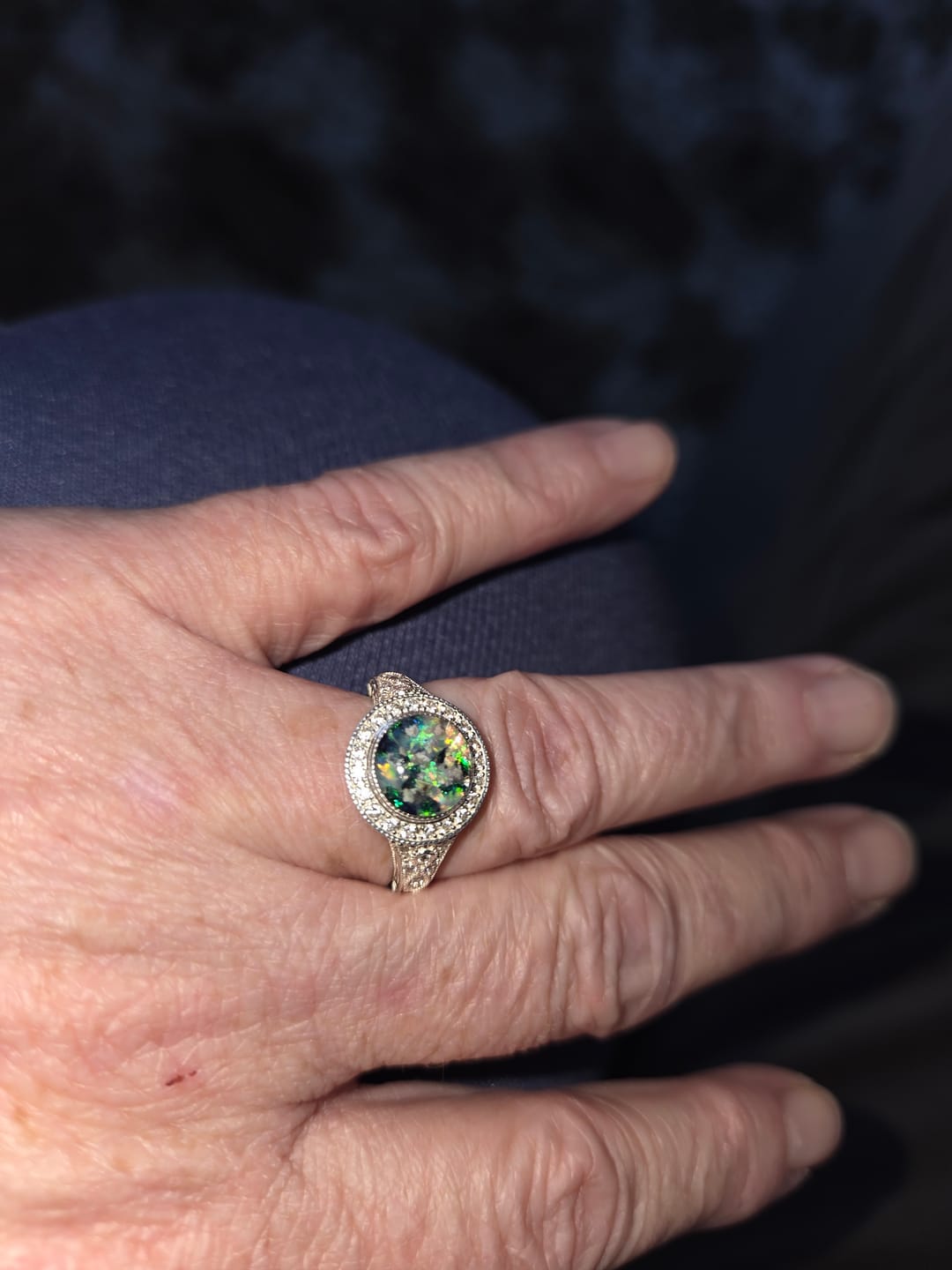 Customer photo review of Bedazzled Filigree Circle Opal Cremation Ring