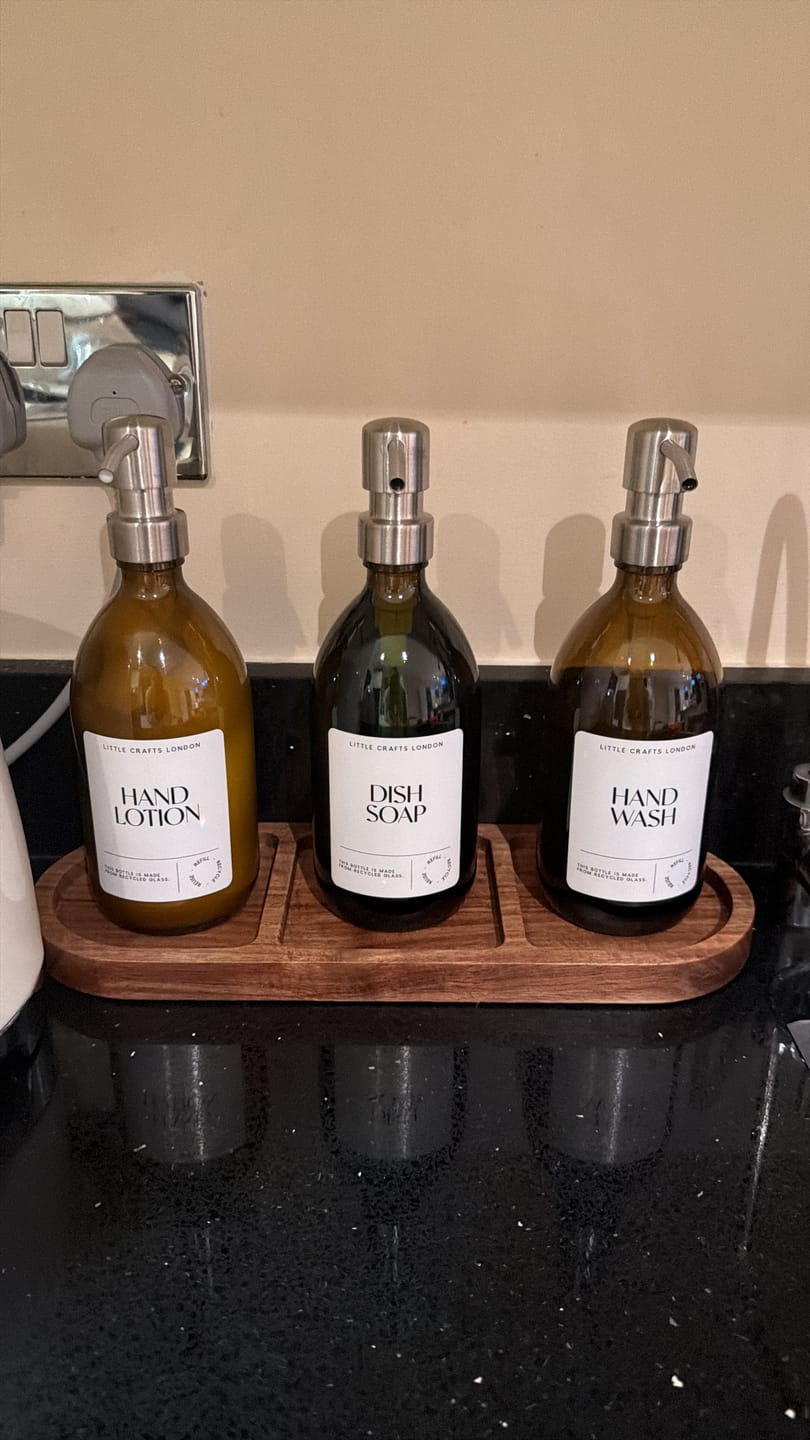 Customer photo review of Set of 3 Reusable Amber Glass Bottles 500 ML with Metal Pump and Long Tray
