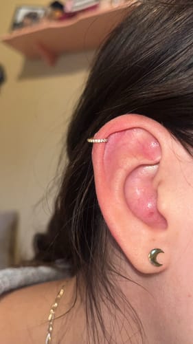 Customer photo review of Piercing Infinity con Zirconias Titanio