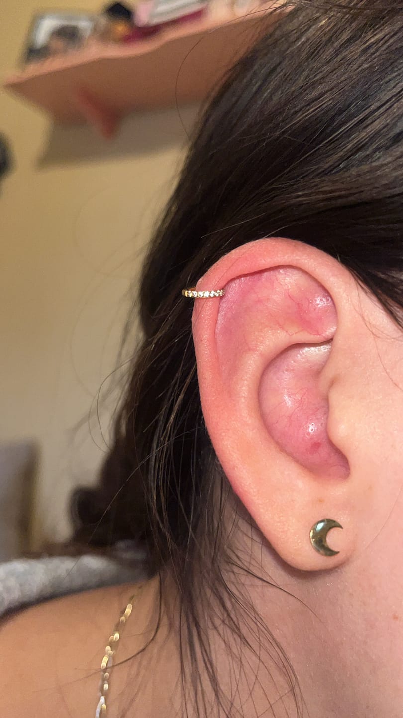 Customer photo review of Piercing Infinity con Zirconias Titanio
