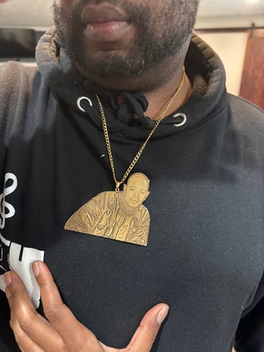 Customer wearing the large Custom Photo Engraved Pendant Necklace with a gold-colored chain.