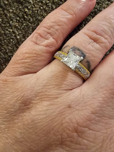 Customer photo review of Solitaire Princess Moissanite Swirling Scroll Two Tone Engagement Ring