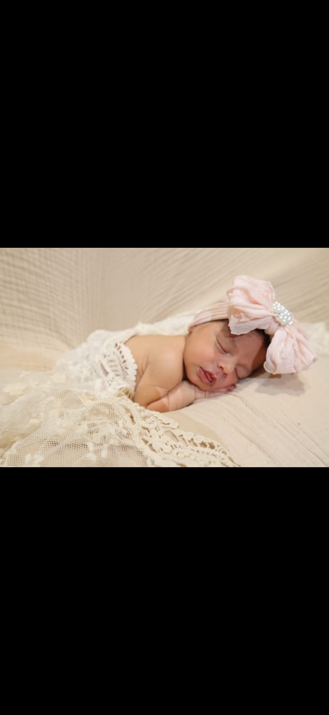 Customer photo review of Fancy Feather Ruffled Headband