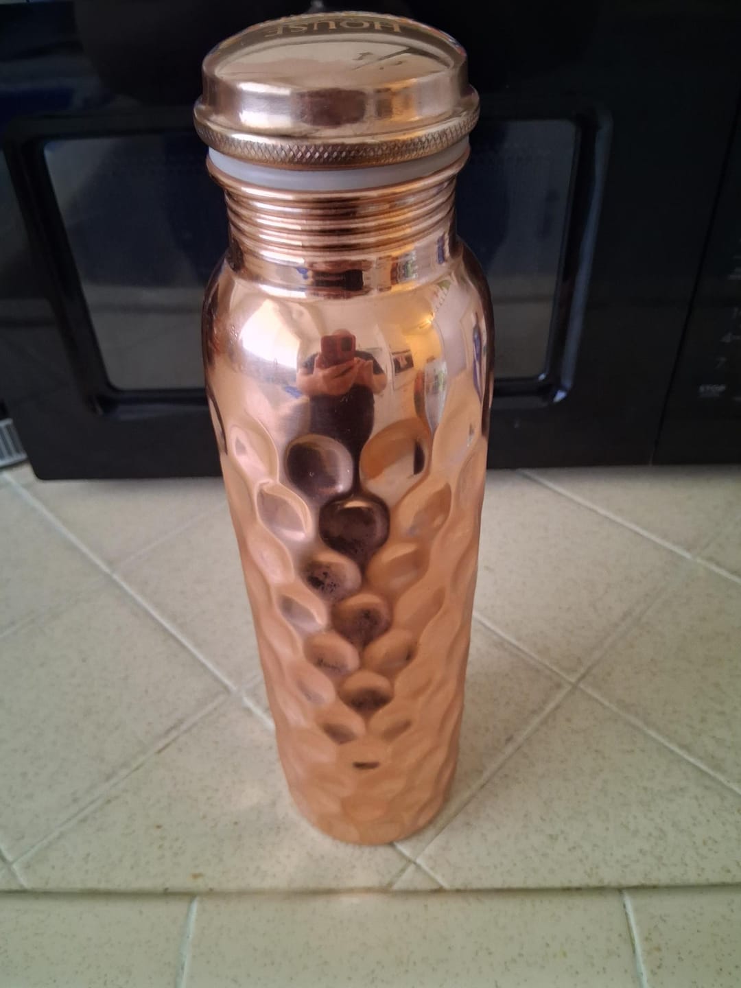 Customer photo review of Special Edition Diamond-Cut Honeycomb Copper Water Bottle | Textured Anti-Slip Grip