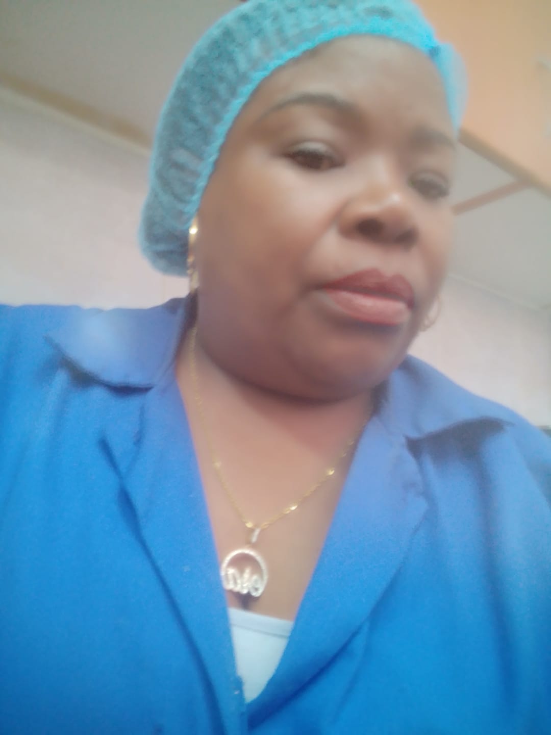 Customer photo review of Gold Precious Logo Necklace